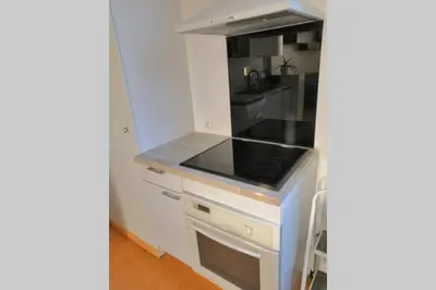 Cuisine ou kitchenette dans l'établissement Appartement proche de Paris comme à la maison