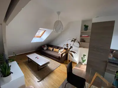 Coin salon dans l'établissement Appartement hyper centre cathédrale avec parking gratuit
