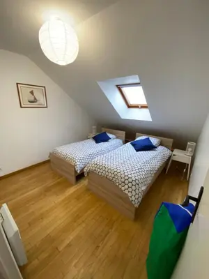 Un ou plusieurs lits dans un hébergement de l'établissement Appartement hyper centre cathédrale avec parking gratuit