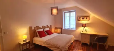Un ou plusieurs lits dans un hébergement de l'établissement Maison tout confort avec jardin - CHANTILLY, SENLIS, PARC ASTERIX, PARIS CDG