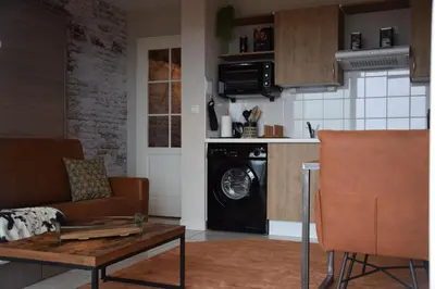 Cuisine ou kitchenette dans l'établissement Ces jours en baie Le vue mer