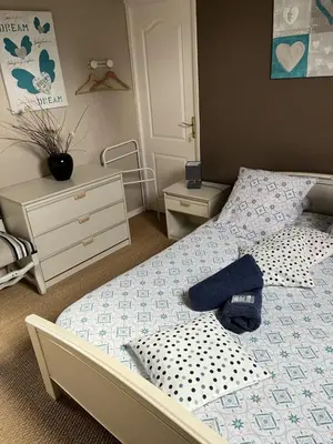 Un ou plusieurs lits dans un hébergement de l'établissement Chambres d'hôte du Domaine de la Reine Blanche