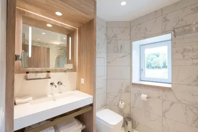 Salle de bains dans l'établissement Le Moulin des Marais
