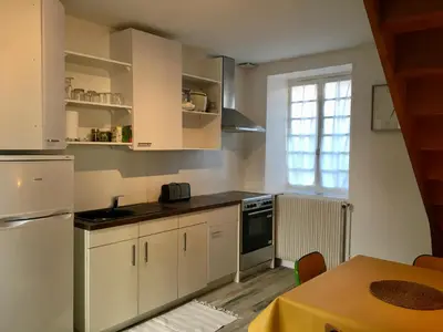 Cuisine ou kitchenette dans l'établissement Gite Vénérand