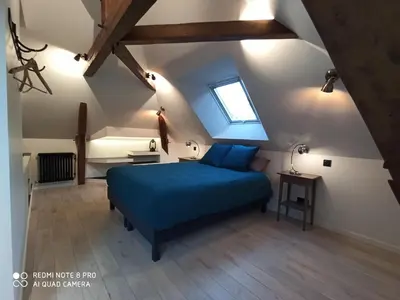 Un ou plusieurs lits dans un hébergement de l'établissement Chambre chez l'habitant Les Aubes du Vexin