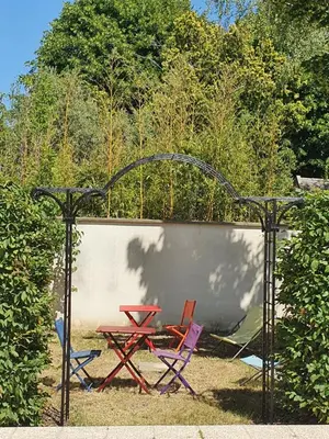 Jardin de l'établissement Hôtel et Chambres d'hôtes Les Mureaux - Les chambres de la Marina