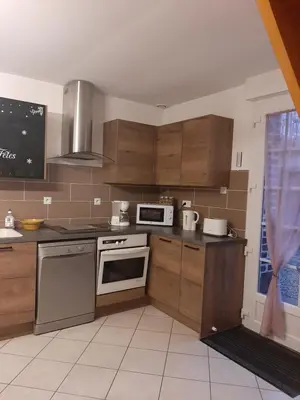 Cuisine ou kitchenette dans l'établissement La petite maison