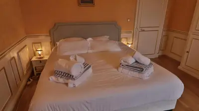 Un ou plusieurs lits dans un hébergement de l'établissement Chateau du boulay morin