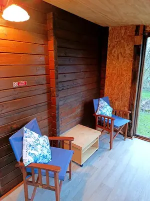 Coin salon dans l'établissement Chalet à la campagne