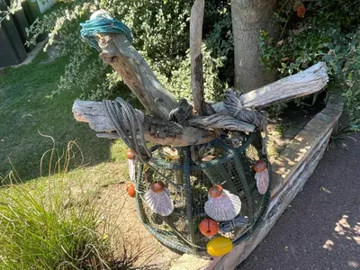 Jardin de l'établissement Gîte HIRONDELLE - PARKING PRIVÉ