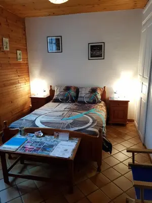 Un ou plusieurs lits dans un hébergement de l'établissement Au Grand Sapin Chambres chez l'habitant