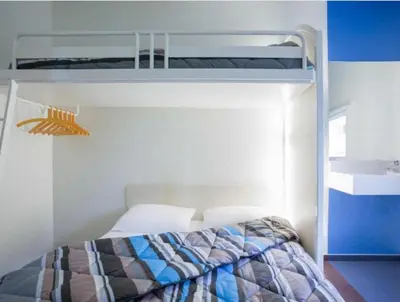 Un ou plusieurs lits dans un hébergement de l'établissement MELINESS Hotel