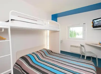 Un ou plusieurs lits dans un hébergement de l'établissement MELINESS Hotel