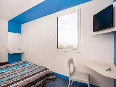 Télévision ou salle de divertissement dans l'établissement MELINESS Hotel