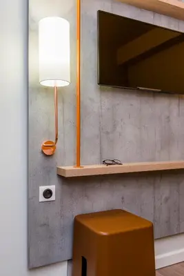 Télévision ou salle de divertissement dans l'établissement ibis budget Rouen Centre Rive Gauche