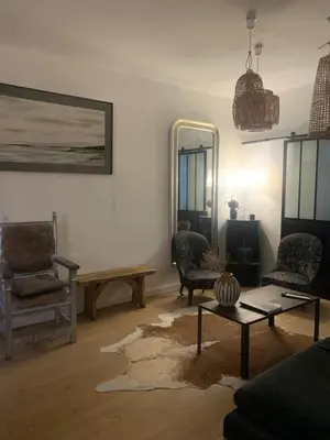 Coin salon dans l'établissement Les Chambres du Verger