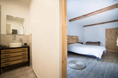 Un ou plusieurs lits dans un hébergement de l'établissement Les Chambres d'hotes de Sophie