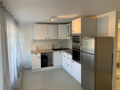 Cuisine ou kitchenette dans l'établissement maison 3 pièces