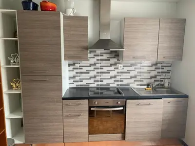 Cuisine ou kitchenette dans l'établissement Grand Appartement de 3 pièces