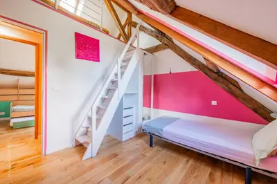Un ou plusieurs lits dans un hébergement de l'établissement Le Colombier - Magnifique Maison avec Piscine