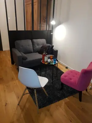 Coin salon dans l'établissement Escapade Amiens
