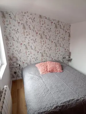 Un ou plusieurs lits dans un hébergement de l'établissement CHARMANTE MAISON PRES DE DIEPPE