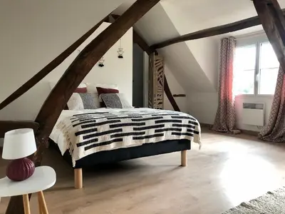 Un ou plusieurs lits dans un hébergement de l'établissement Le charme et l’original