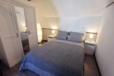 Un ou plusieurs lits dans un hébergement de l'établissement Gîte Le Balcon Flaubert