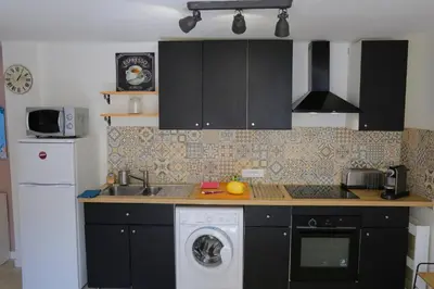 Cuisine ou kitchenette dans l'établissement Superbe appartement tout confort 
