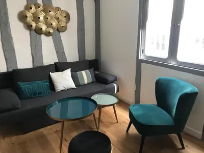 Coin salon dans l'établissement Charmant T1 Vieux Rouen