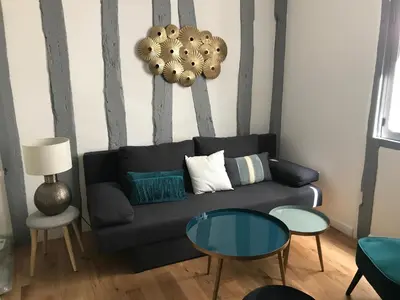 Coin salon dans l'établissement Charmant T1 Vieux Rouen