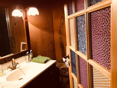 Salle de bains dans l'établissement Cottage les Forières