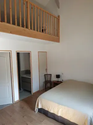 Un ou plusieurs lits dans un hébergement de l'établissement Chambres du Campreux