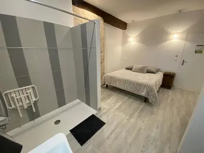 Un ou plusieurs lits dans un hébergement de l'établissement La Ferme de Labbeville