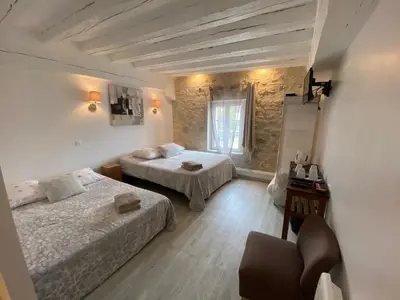 Un ou plusieurs lits dans un hébergement de l'établissement La Ferme de Labbeville