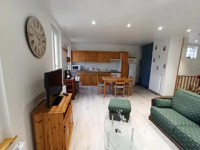 Télévision ou salle de divertissement dans l'établissement Le Nid de la Baie de Somme