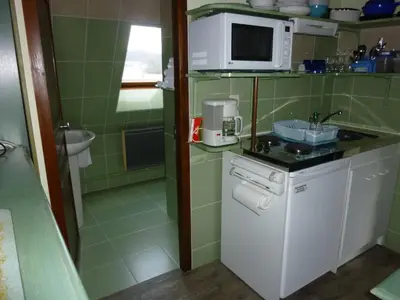 Cuisine ou kitchenette dans l'établissement la ferme des granges