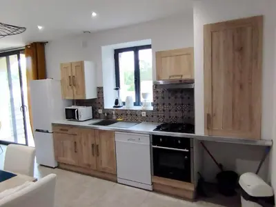 Cuisine ou kitchenette dans l'établissement L'Abaca 23