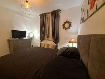 Un ou plusieurs lits dans un hébergement de l'établissement Appartement de vacances a St Pierre du Vauvray
