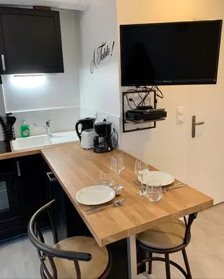 Cuisine ou kitchenette dans l'établissement Studio centre ville -001
