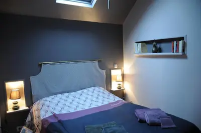 Un ou plusieurs lits dans un hébergement de l'établissement Gîte Mi Do