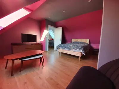 Un ou plusieurs lits dans un hébergement de l'établissement Granne de Lin étage