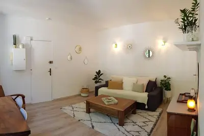 Coin salon dans l'établissement Appartement cosy proche du CHU