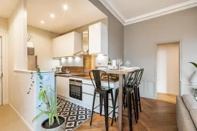 Cuisine ou kitchenette dans l'établissement Beaux-arts • 2 chambres 2 SDB • Parking privé