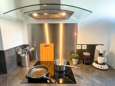 Cuisine ou kitchenette dans l'établissement Duplex au pied de la gare - NETFLIX - Hyper-centre