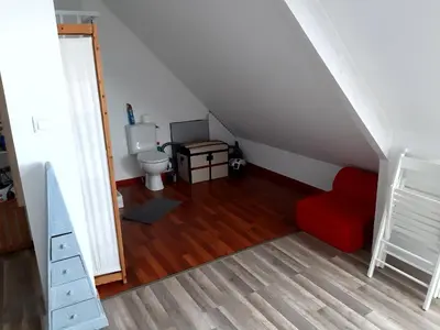 Coin salon dans l'établissement Comme chez vous