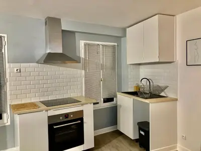 Cuisine ou kitchenette dans l'établissement Alex Place's