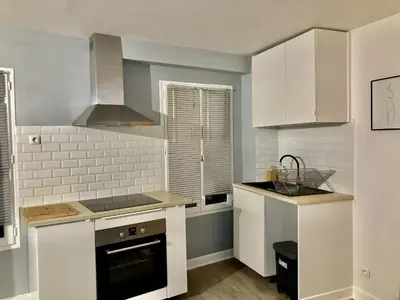 Cuisine ou kitchenette dans l'établissement Alex Place's