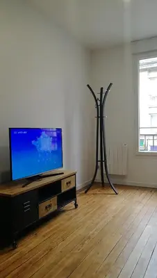 Télévision ou salle de divertissement dans l'établissement L'escale - Appartement en centre ville