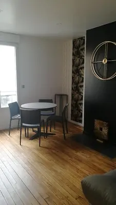 Coin salon dans l'établissement L'escale - Appartement en centre ville
